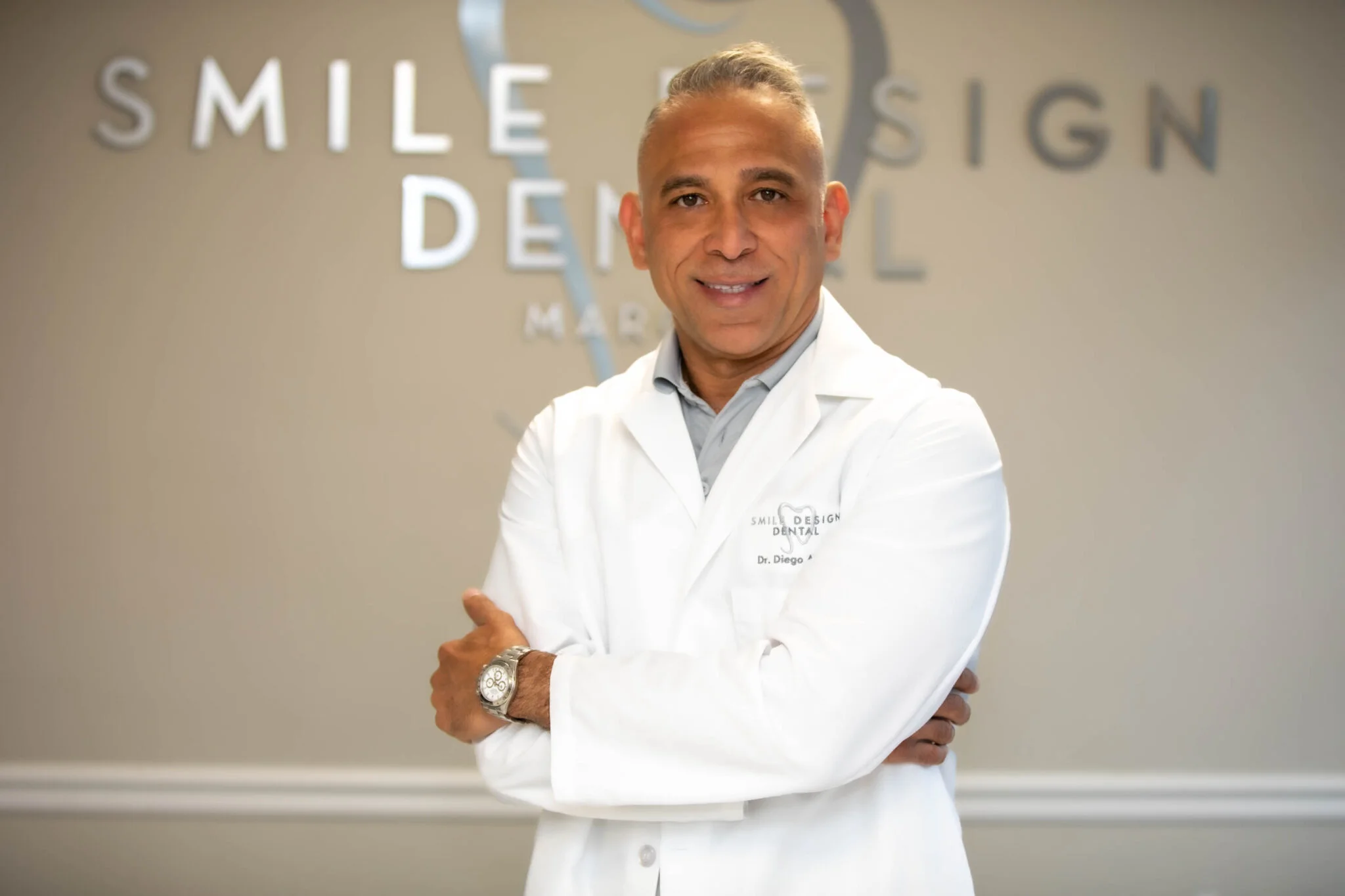 a man in a white coat